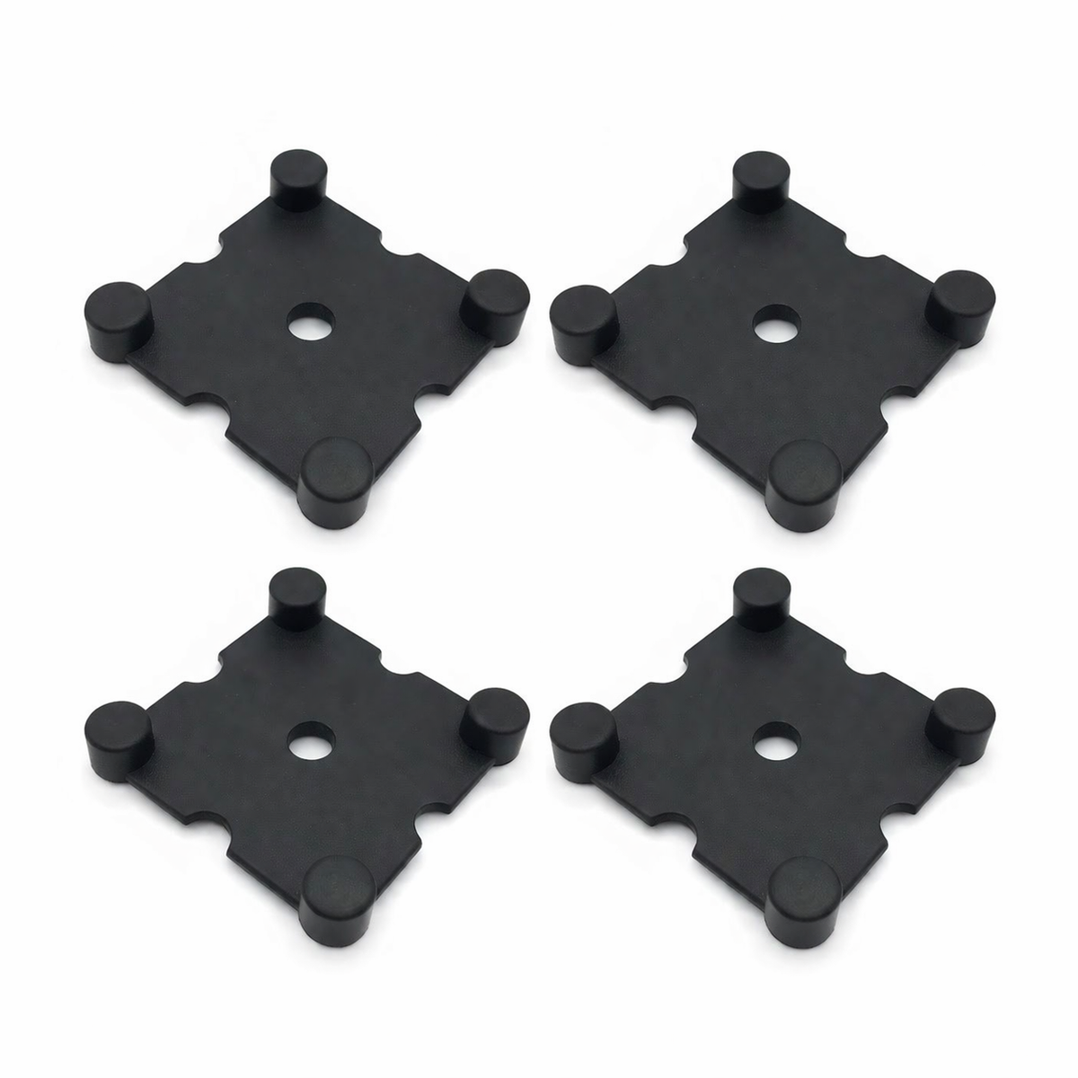 this shows four Rubber gym mat connectors sold by Equipped Gym 