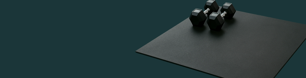 Rubber gym flooring tile and hex dumbbells